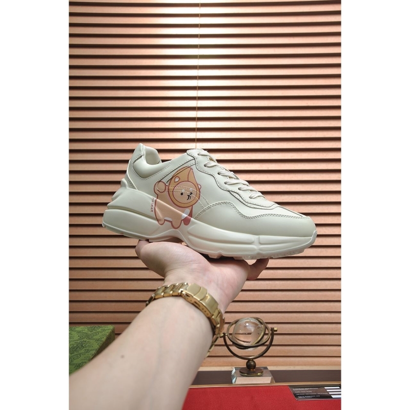 G*u*i sneakers